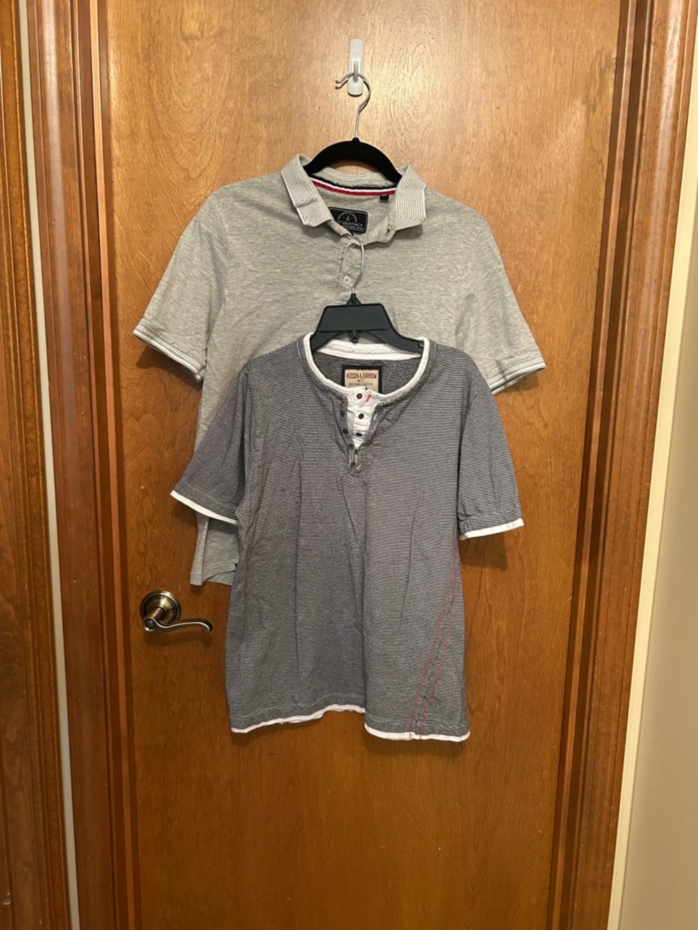 Like new! Pack of 2 Men short sleeve shirts size small, polo and layered tee.